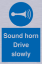 sound-horn-drive-slowly-warehousing-and-delivery-sign~